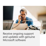 Man on laptop and phone, Microsoft support concept.